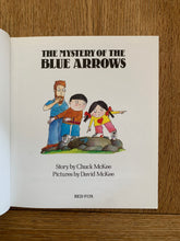 The Mystery of the Blue Arrows (signed with doodle)