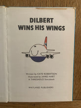 Dilbert Wins His Wings