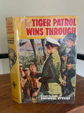 The Tiger Patrol Wins Through