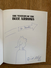 The Mystery of the Blue Arrows (signed with doodle)