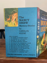 The Clue of the Broken Locket